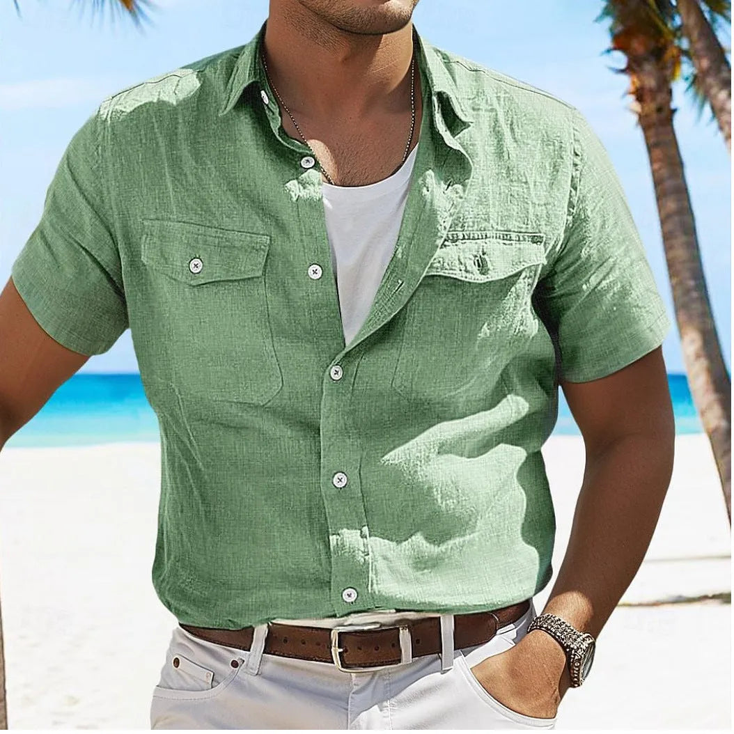 Men's loose grey linen shirt with polo collar and long sleeves on a hanger.