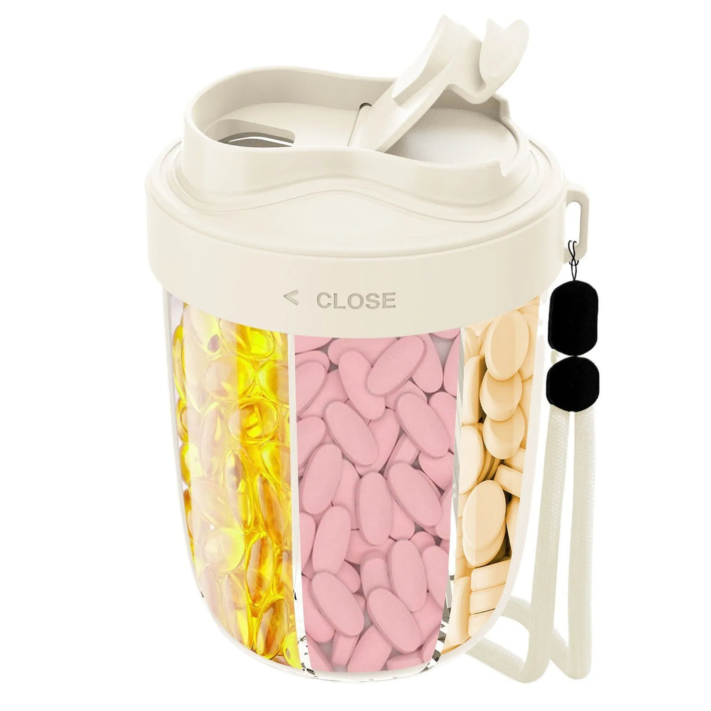 Beige plastic supplement storage box with seven compartments for tablets on a white background