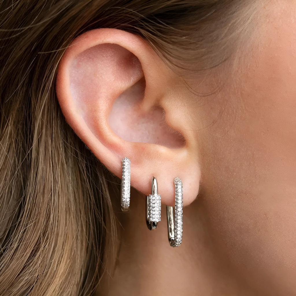 Three geometric square ear clips with micro inlaid zircon detailing in gold and white gold colours