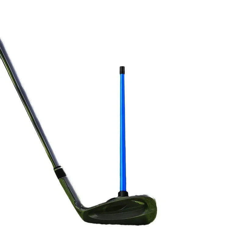 Red and blue magnetic golf swing alignment trainer on practice mat