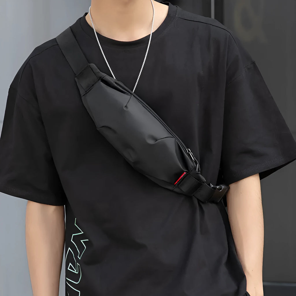 Black Oxford cloth crossbody waist pack with multiple internal pockets showing dimensions