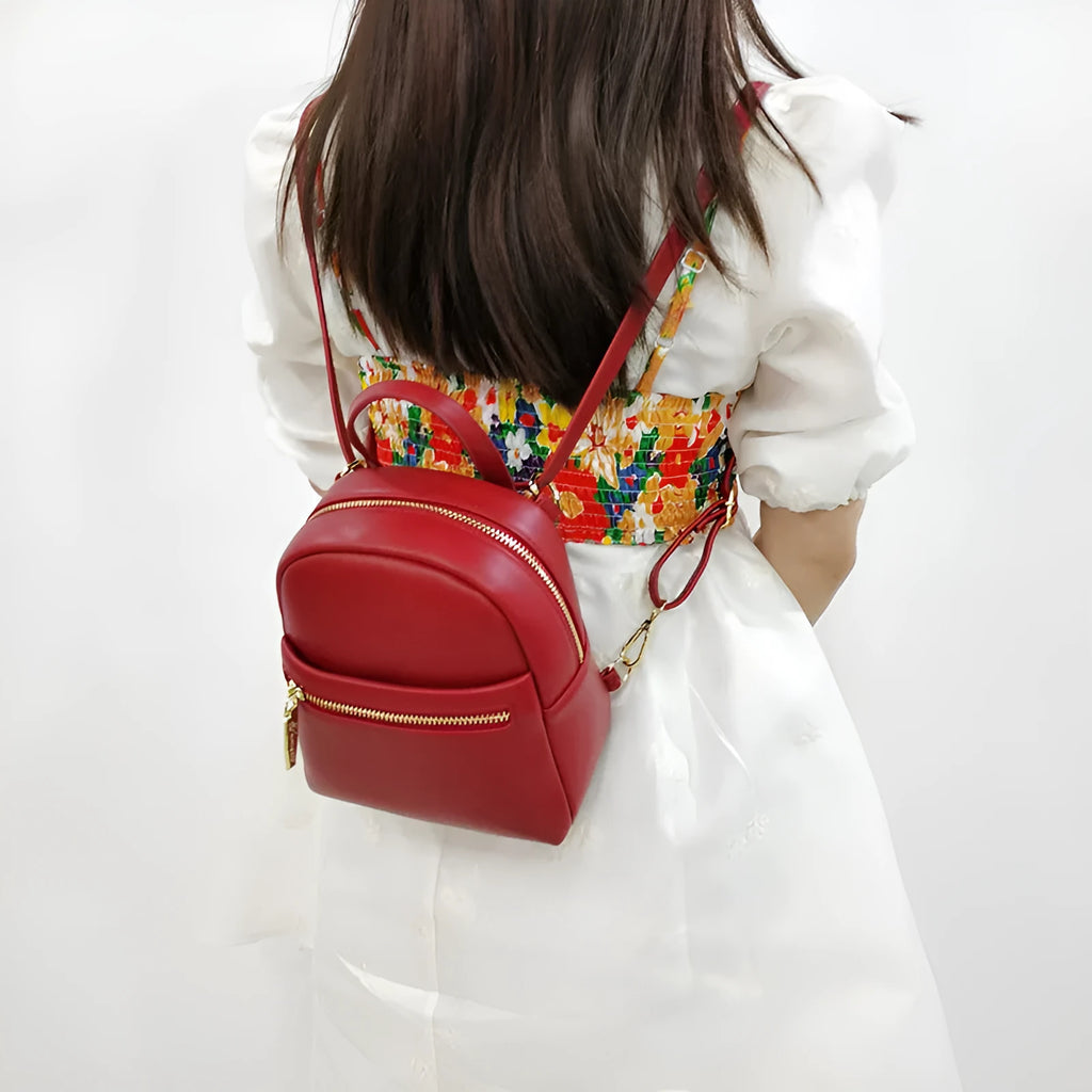 Soft PU mini backpack in street-trend style, shown in one of six available colours.