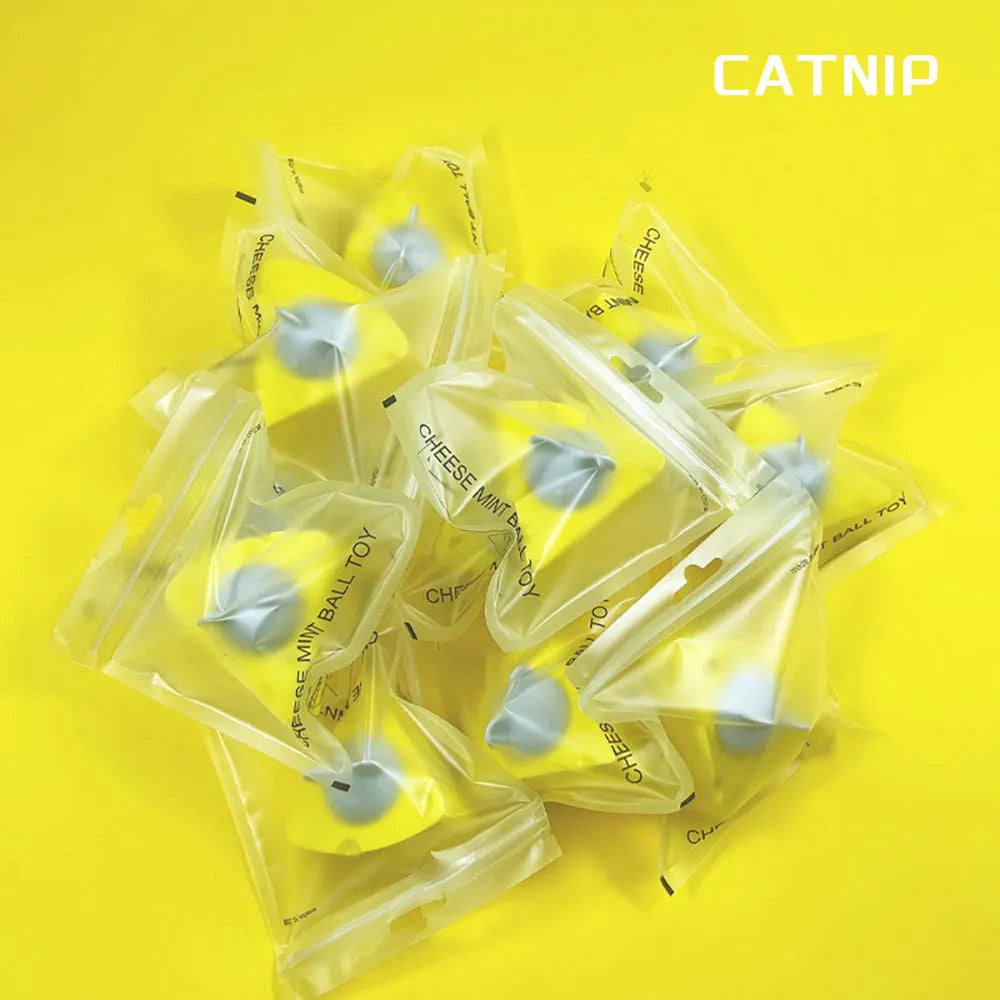 Five yellow catnip and silvervine chew toy balls for cats on a white background.