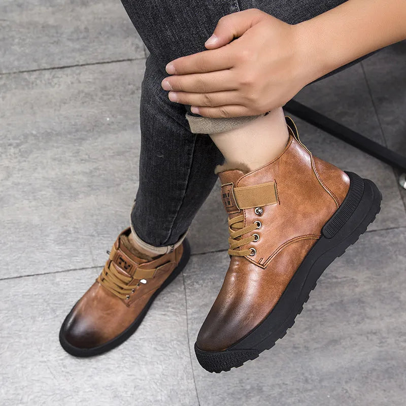 Black and brown platform Martin boots with high-top design and rubber sole