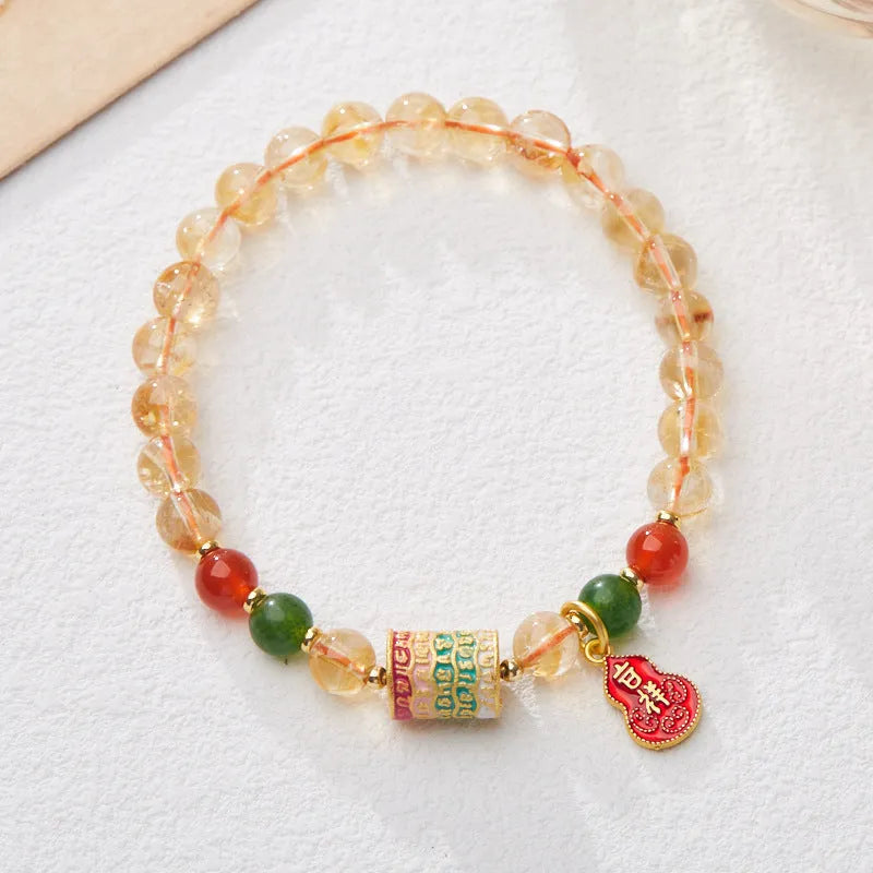 Hand-woven citrine five sutra bracelet with 6mm crystal beads in geometric pattern
