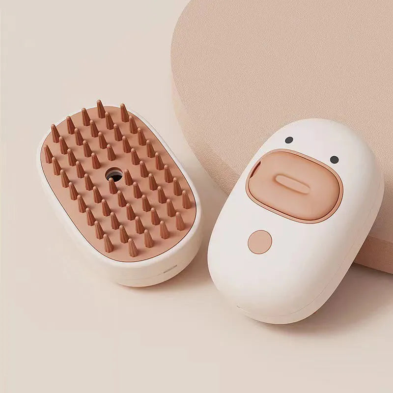 White rechargeable pet steam brush with rubber teeth and water tank for dogs and cats