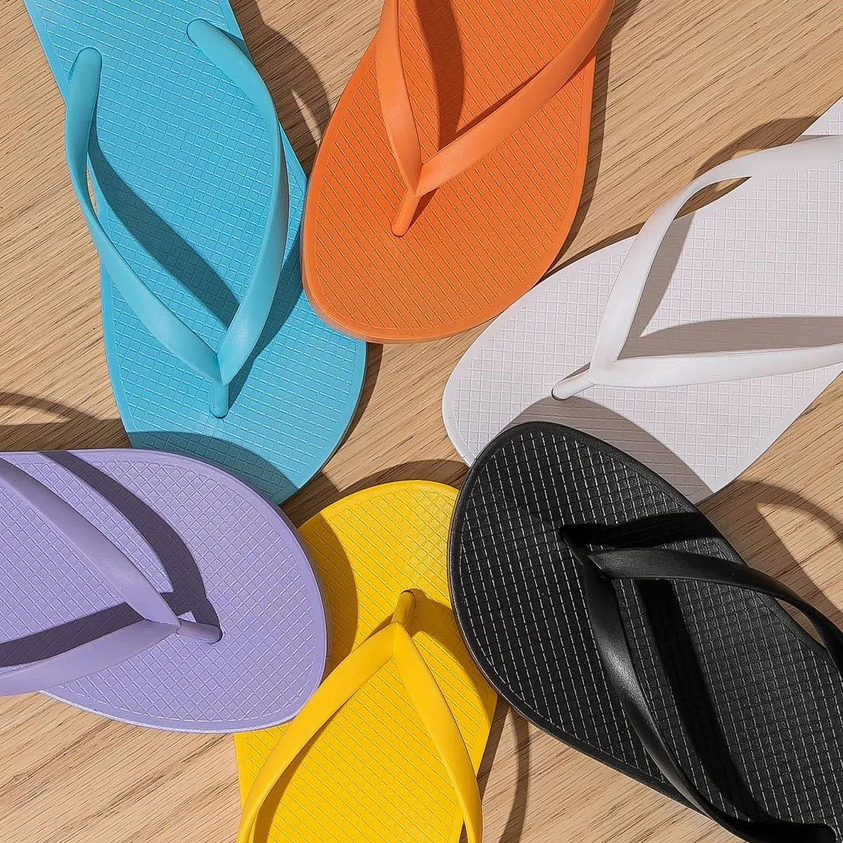 Foldable beach slippers with non-slip PVC sole and hollow-out breathable design in multiple colours