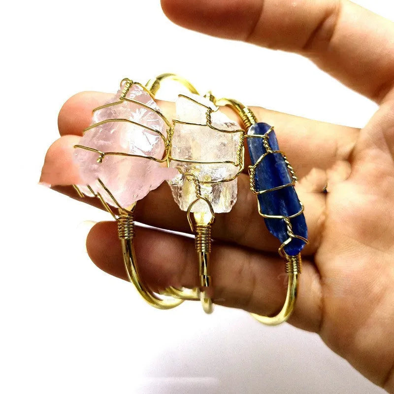 Natural crystal rough stone bracelet with gold winding metal accents in geometric bohemian style