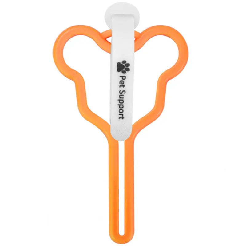 Hands-free dog poop bag holder with Velcro strap attached to a leash.