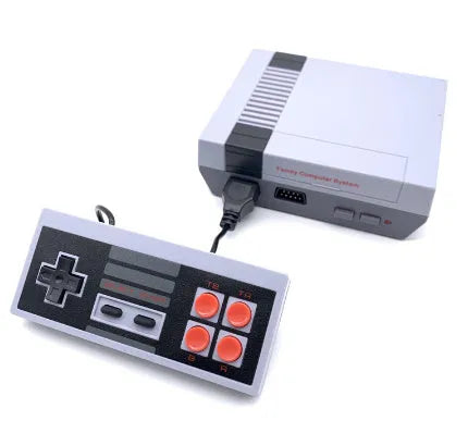 Red and grey NES retro mini game console with two rectangular controllers on a table.