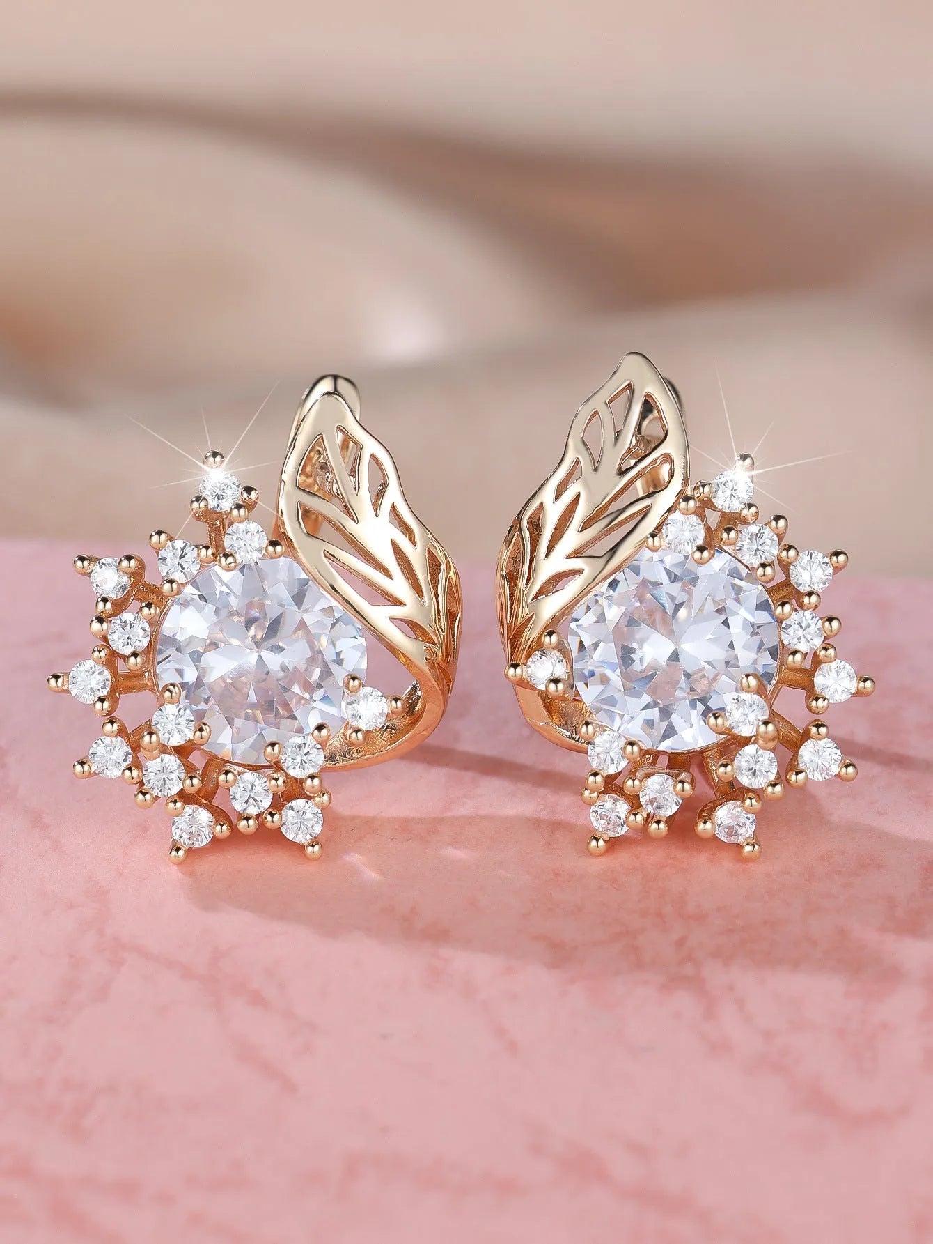 Round flowers feather zircon earrings in rose gold electroplated finish with multiple diamond colour options
