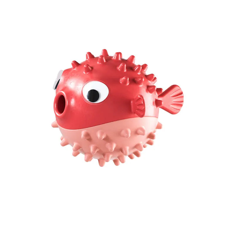 Green fish-shaped interactive dog toy with textured surface for medium and large dogs