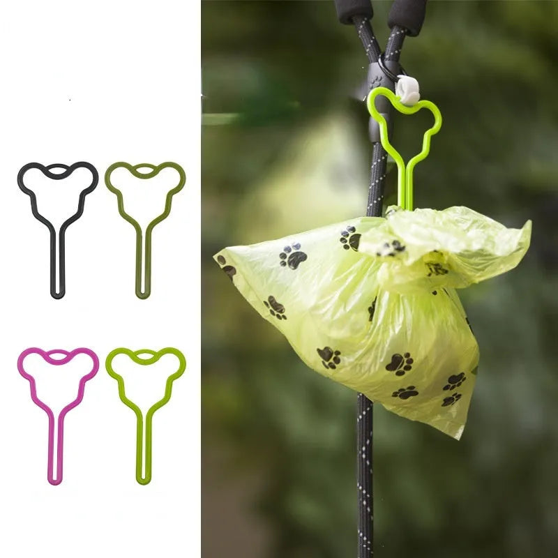 Hands-free dog poop bag holder with Velcro strap attached to a leash.