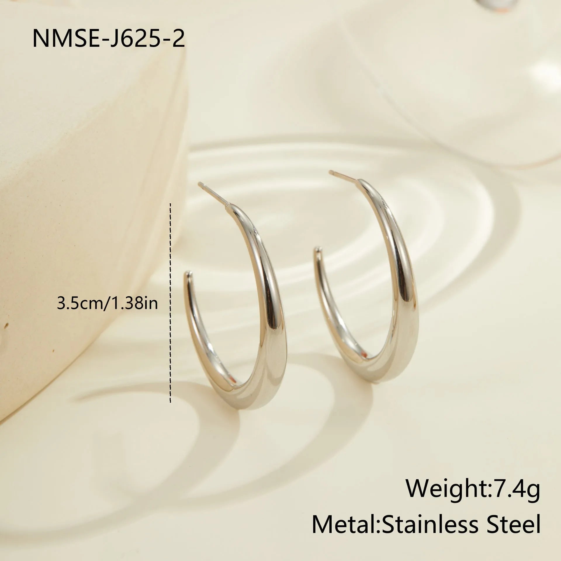 Titanium steel hoop earrings with geometric round shape in gold and steel colour options