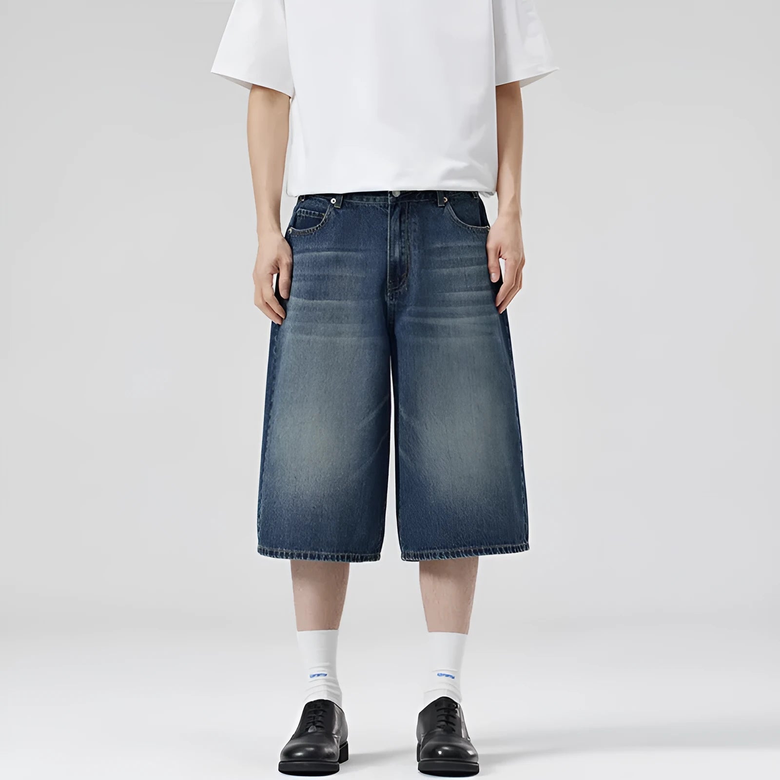 Men's light blue cotton denim loose-fit straight-leg summer shorts on a neutral background