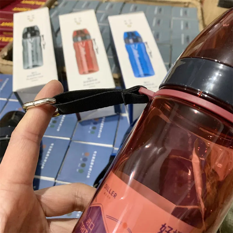 Chinese style sports water bottle with removable tea infuser compartment in blue, red, black or grey.