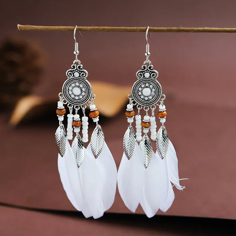 Feather pattern drop earrings with round oil craft design in alloy with electroplated finish