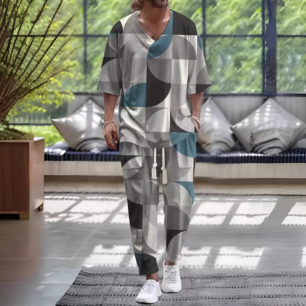 Men's light grey cropped sleeve V-neck suit jacket and trousers on a hanger.