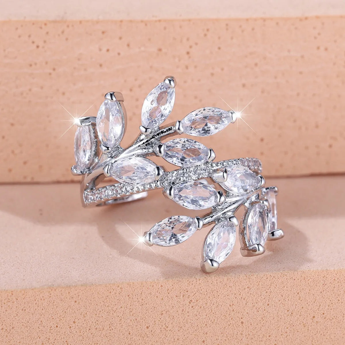 Adjustable copper leaf ring with horse eye zircon accents in multiple colour variations