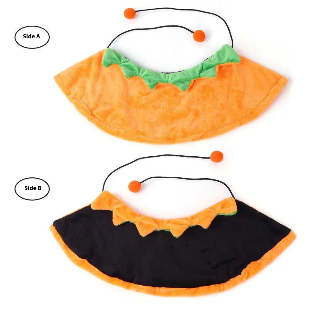Orange plush Halloween pumpkin cloak for a dog or cat showing double-sided design