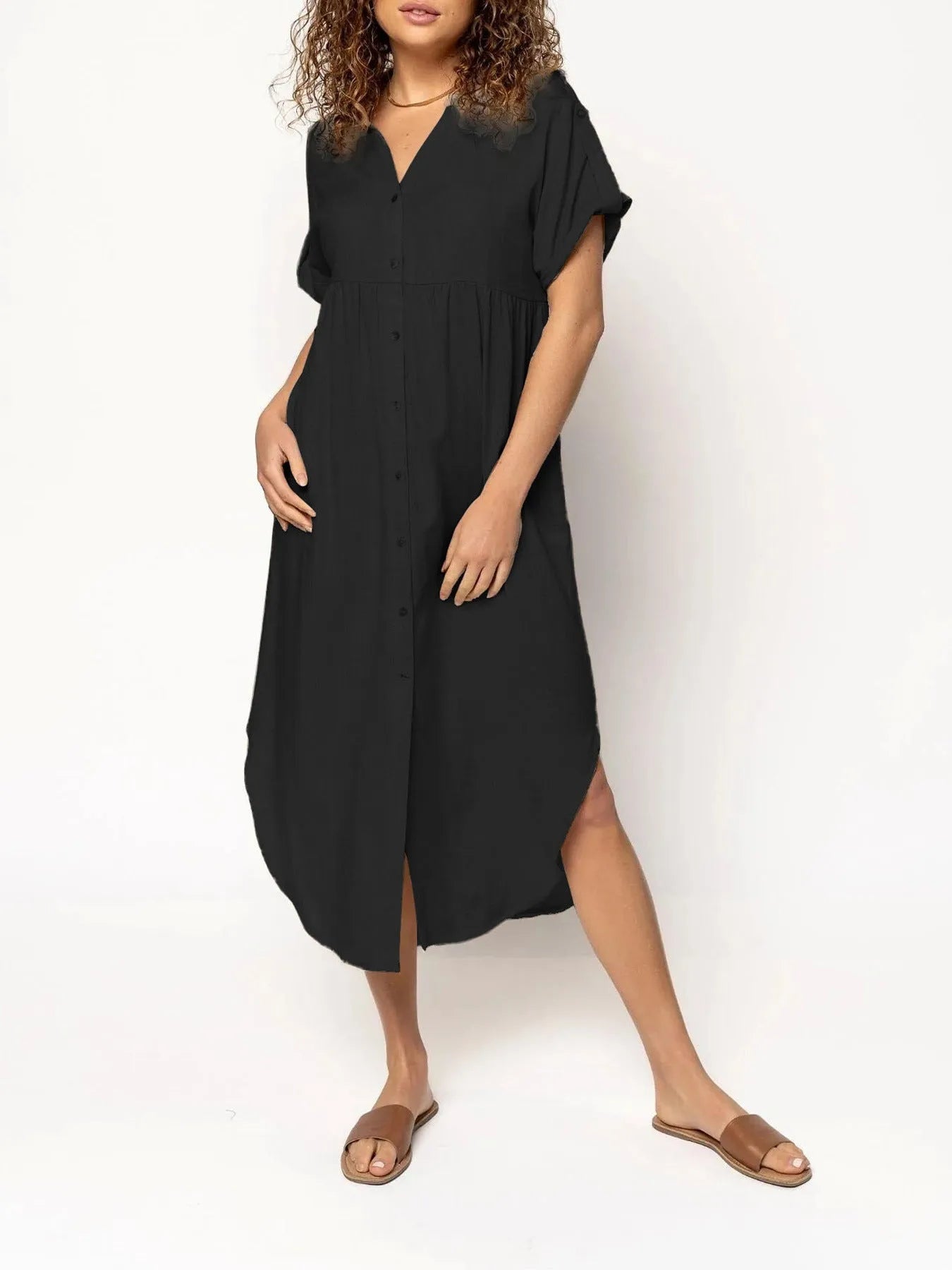 A mid-length casual dress with button detail on the front, shown in a solid colour.