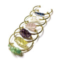 Natural crystal rough stone bracelet with gold winding metal accents in geometric bohemian style