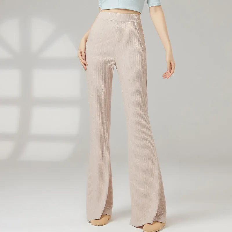 Women's solid colour classical dance practice pants in polyester fabric shown in beige apricot.