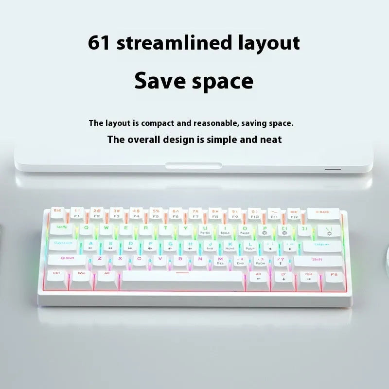 Small bluish-black 61-key mechanical keyboard with wired USB cable showing multiple switch colour options