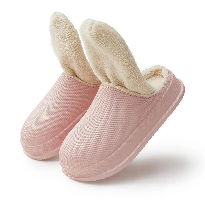Unisex waterproof non-slip cotton slippers with EVA sole in multiple colours on a floor
