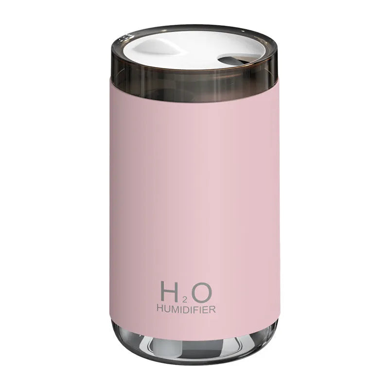 White jellyfish design USB humidifier with nano mist and warm night light on a desk