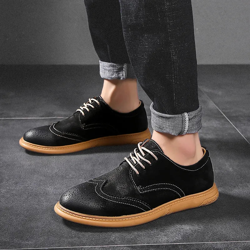 Men's black genuine cowhide leather low top business shoes with lace-up design and rubber sole.