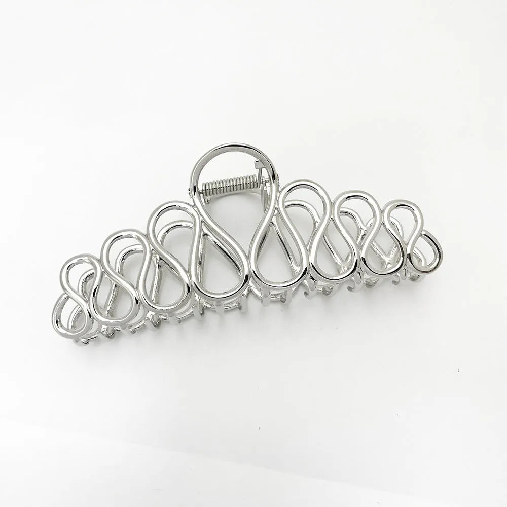 Large gold or silver alloy hair clip with minimalist design and European tassel detailing for women's updo hairstyles