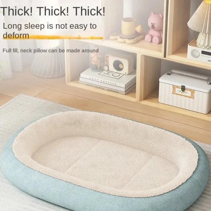 A thick padded dog kennel for small and medium dogs in a grey colour, shown with size dimensions.