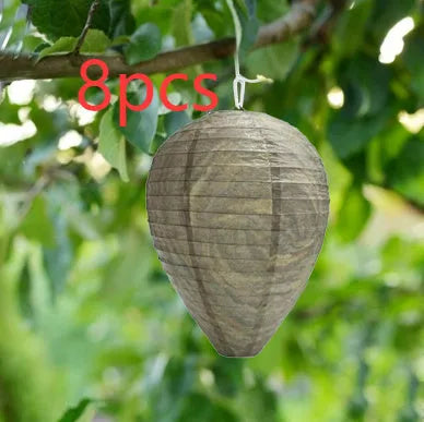 White paper beehive lantern with wire frame measuring 22cm by 28cm