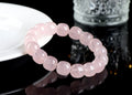 Pink bamboo crystal barrel bead bracelet with 11-12mm geometric beads on wrist