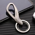 Zinc alloy car key waist hanging double ring in black chrome or nickel colour measuring 8.3 by 3.5 centimetres
