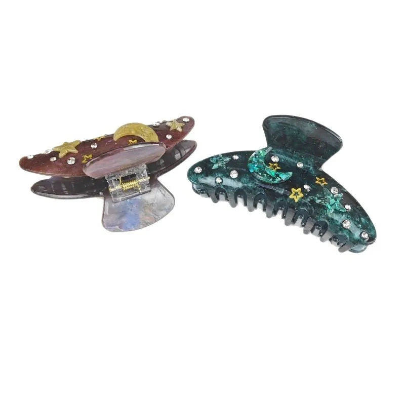 Oversized star moon barrette in celestial colours with irregular minimalist design