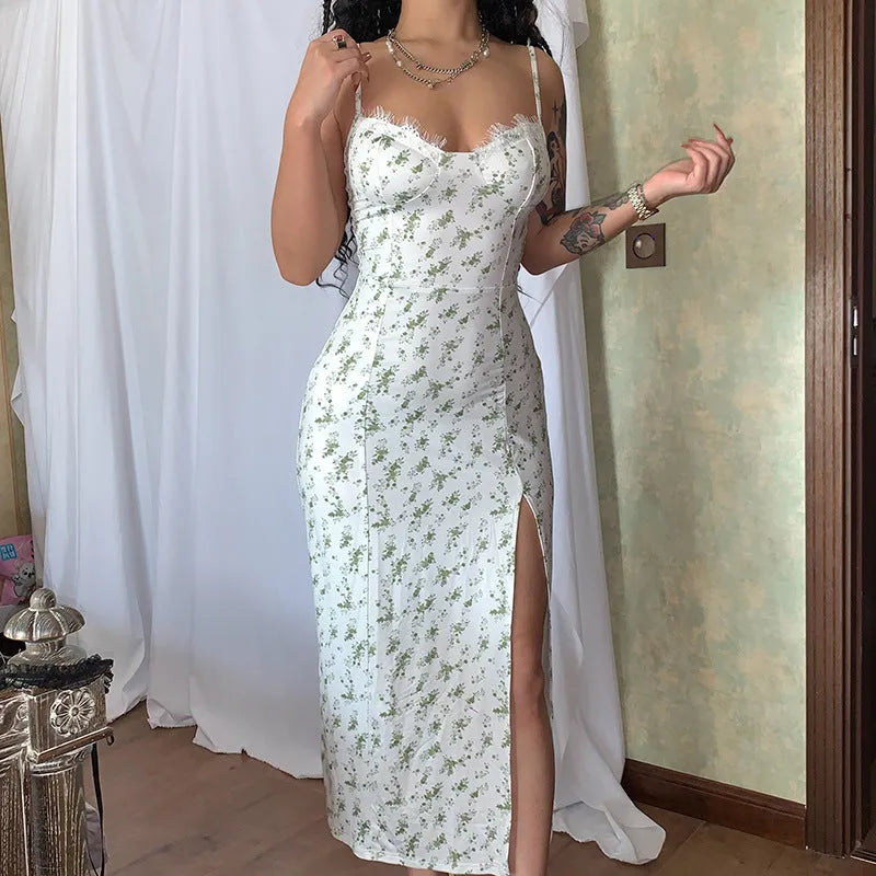 Women's long dress with lace flowers print, slit detail, and suspender straps in solid colour