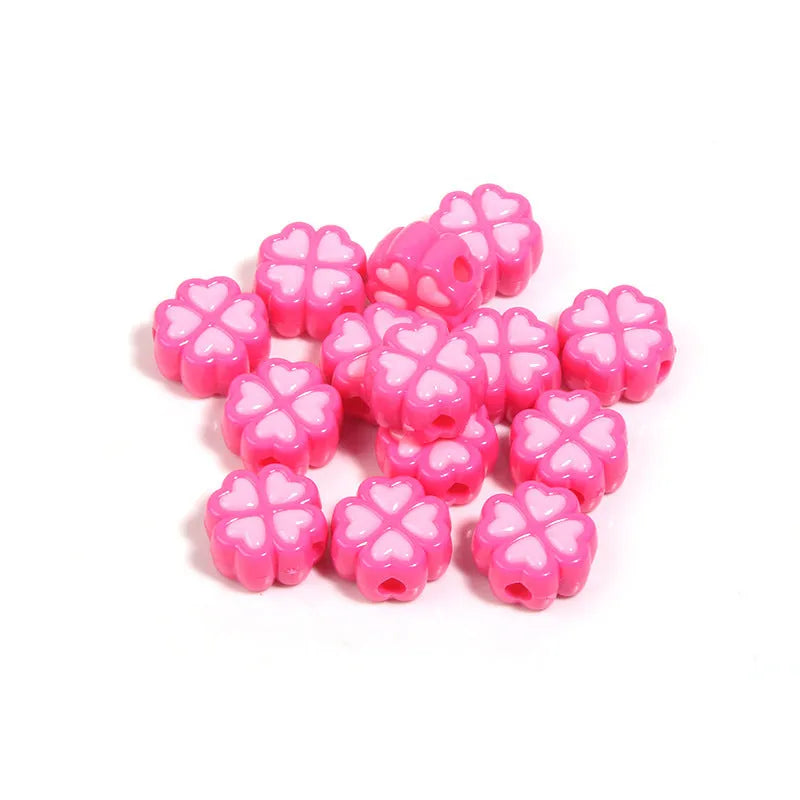 15mm acrylic craft beads with four-leaf clover shape and frosted finish in multiple colours