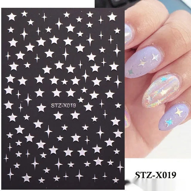 Sheet of black and silver stripe nail art stickers from a cartoon series for DIY manicures.