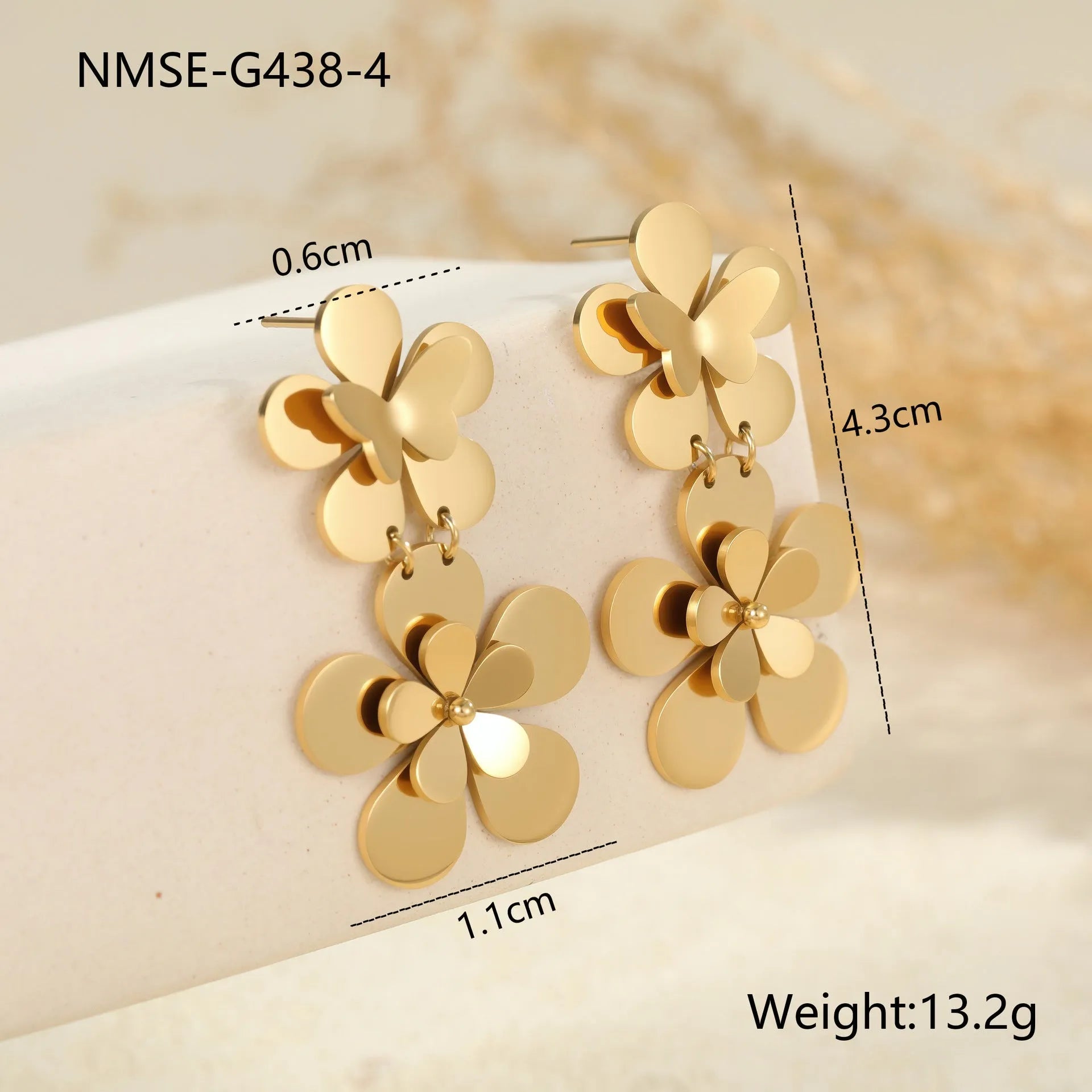 Gold flower butterfly earrings made from stainless steel with 18K electroplated finish