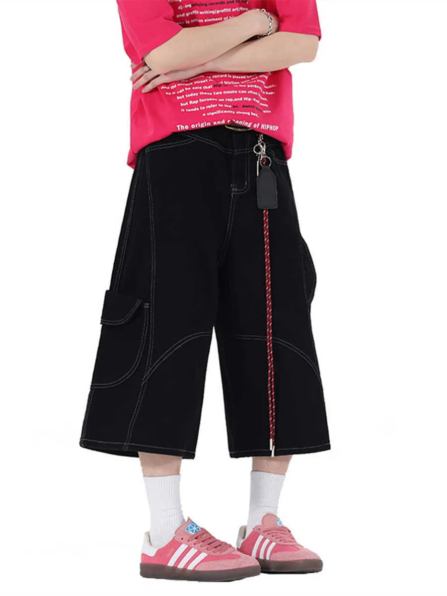 Retro denim workwear shorts with multiple pockets, wide leg cut and cropped trousers length