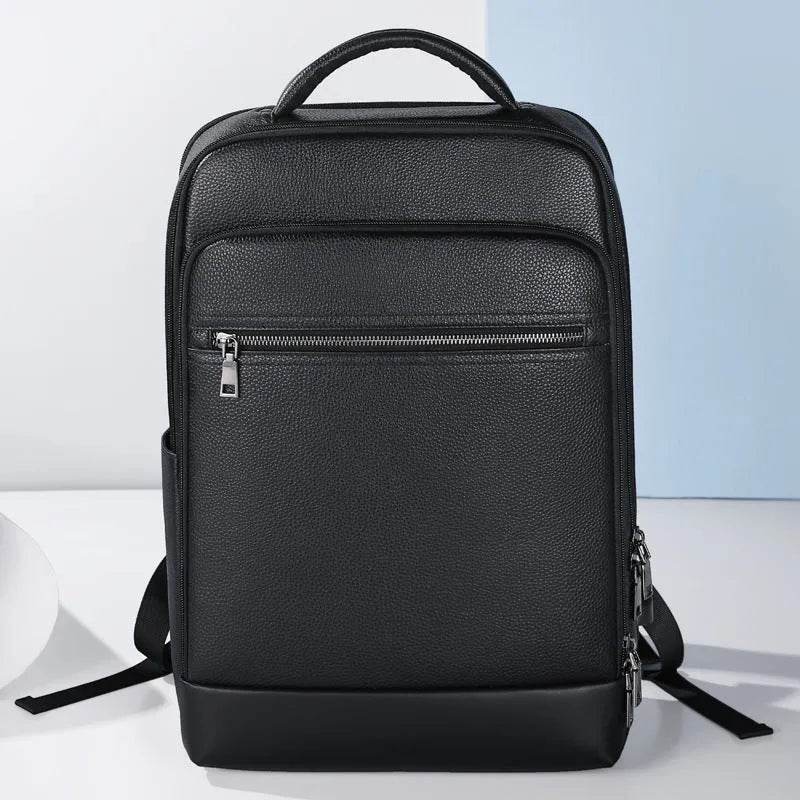 Black genuine leather men's business backpack with curved shoulder straps and sewing line details