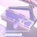 Purple and white mechanical keyboard and mouse wired set with backlight illumination on desktop