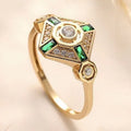 Square geometric emerald diamond fashion ring in lvzuan colour on a white background.