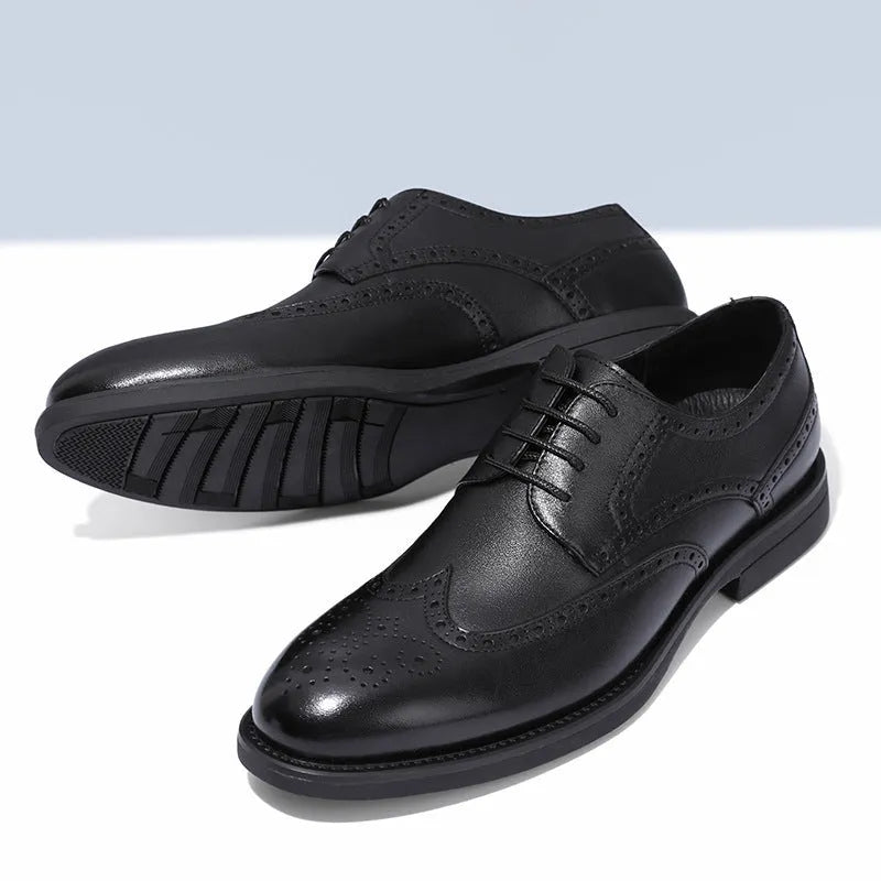 Men's black and brown brogue leather shoes in business style with traditional detailing