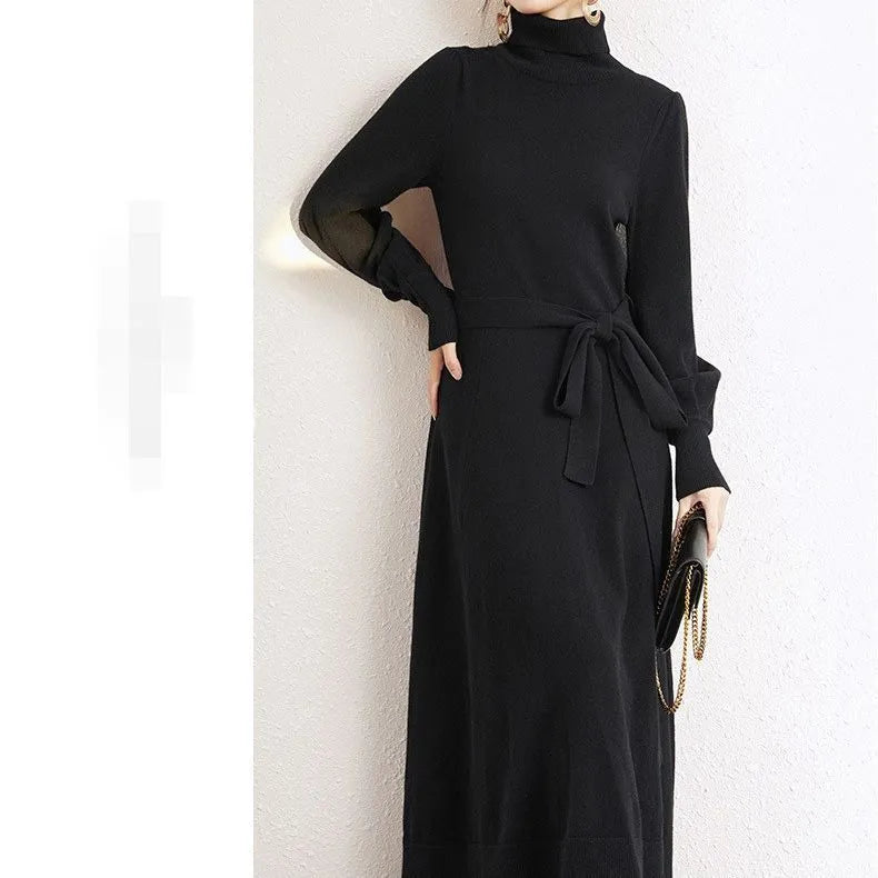 Women's turtleneck long sleeve knit dress in loose fit with big hem and elastic waist.