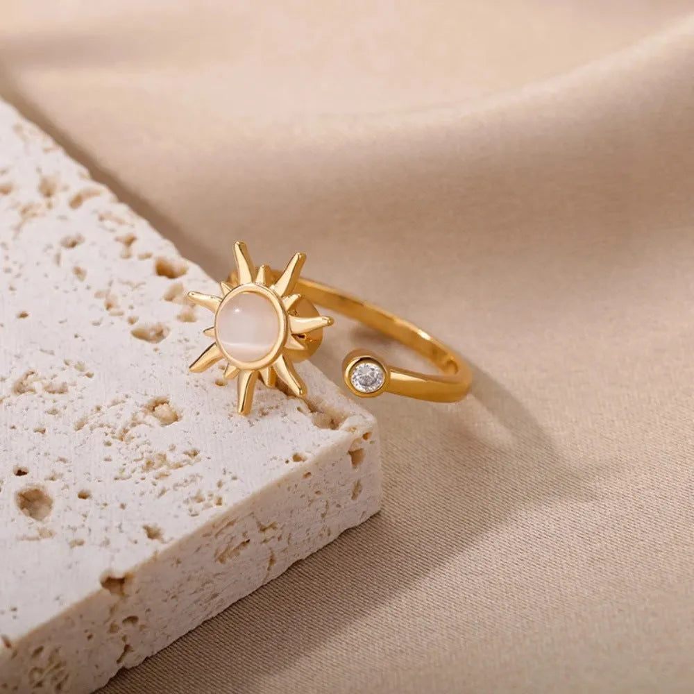 Simple geometric copper decompression ring with rotating mechanism in gold or platinum finish