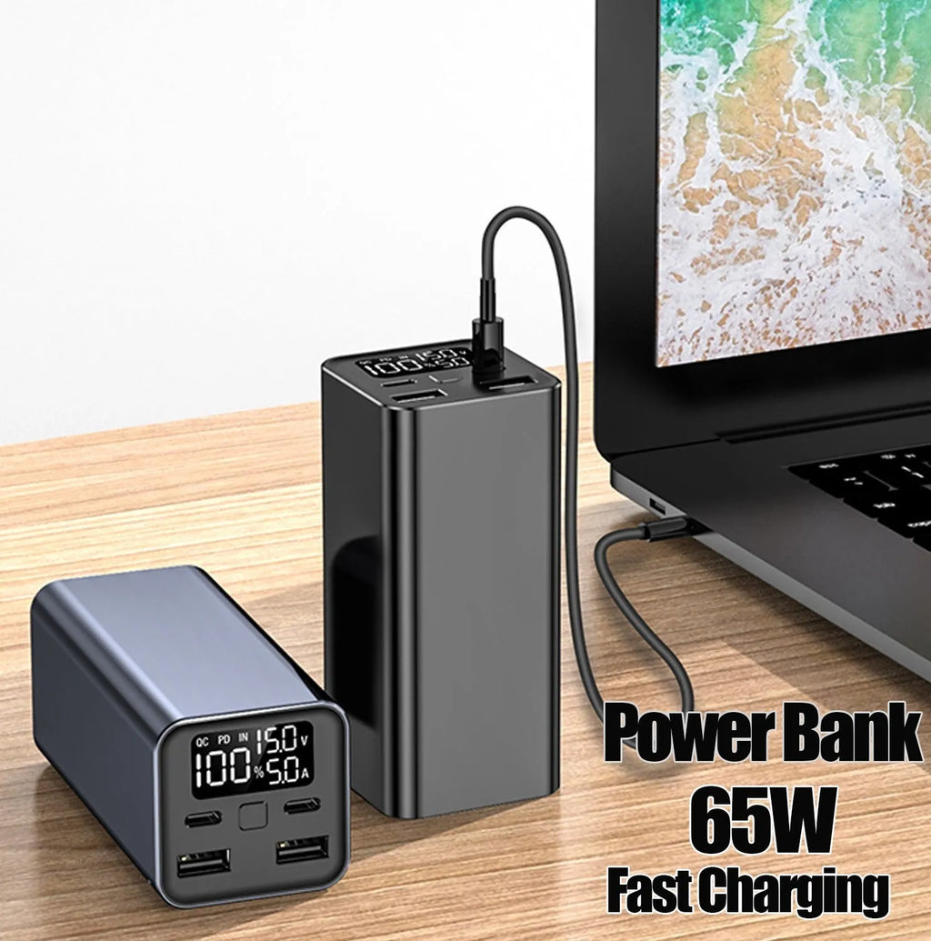 Black high power laptop charging bank showing metal case with 65W output and 20000mAh capacity.