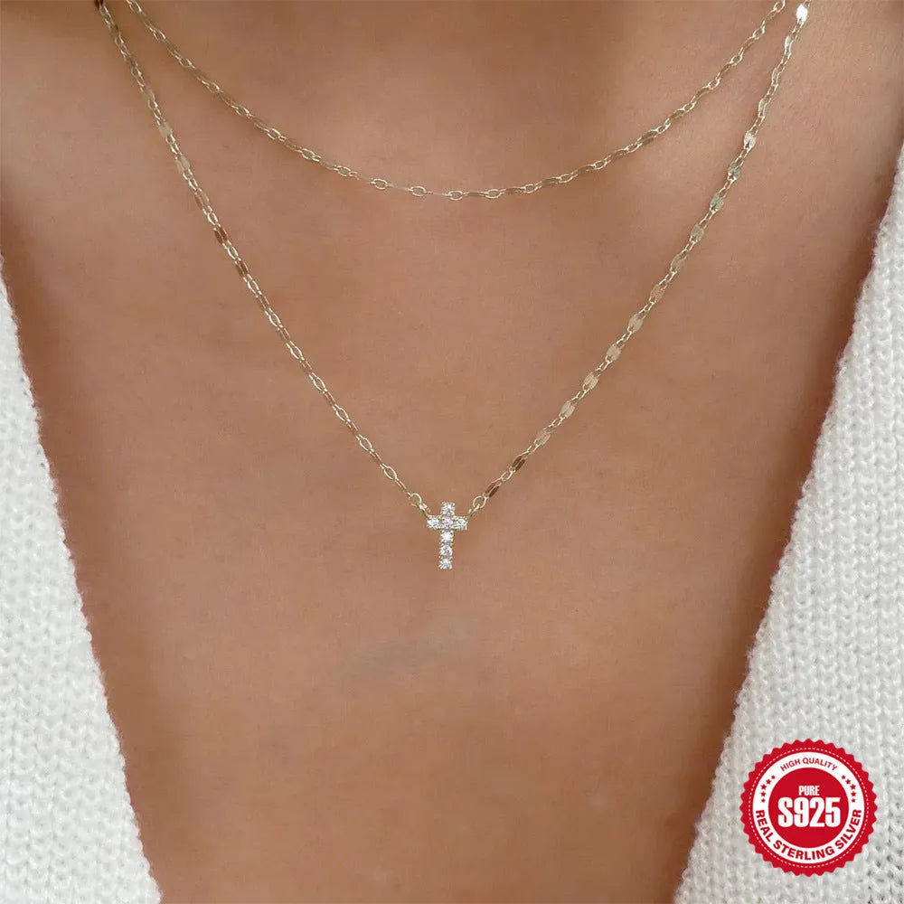 S925 Sterling Silver necklace with a geometric double-layer cross pendant featuring twin diamond detailing.